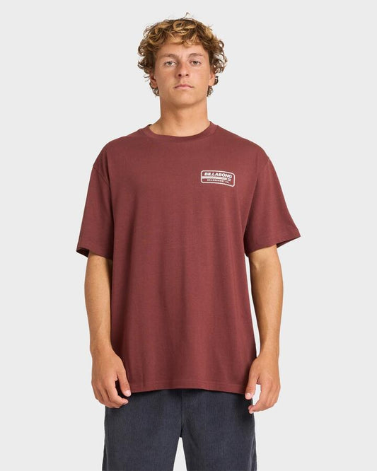 Image of a model wearing Tops. Productname: Billabong Mens Trademark T-Shirt Plum - in Plum colour by brand - Billabong