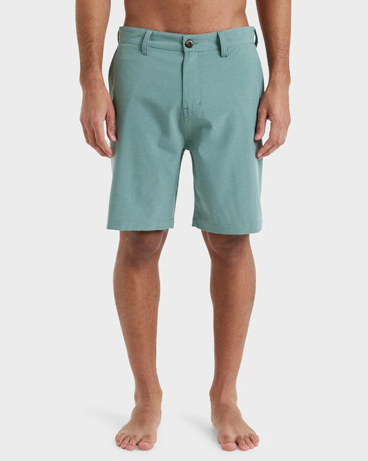 Image of a model wearing Shorts. Product name - Quiksilver Mens Union Heather 19" Hybrid Shorts Sea Spray in Sea Spray colour by brand - Quiksilver