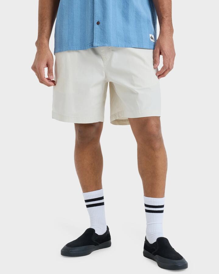 Image of a model wearing Shorts. Product name - Quiksilver Mens Taxer 18" Walkshorts Birch in Birch colour by brand - Quiksilver