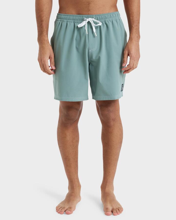 Image of a model wearing Shorts. Product name - Quiksilver Mens Original 18" Swim Shorts Sea Spray in Sea Spray colour by brand - Quiksilver