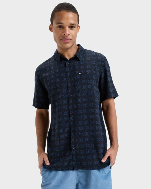 Image of a model wearing Tops. Productname: Quiksilver Mens Safe Paradise Short Sleeve Shirt Black Etched In Stone 32 - in Black Etched In Stone 32 colour by brand - Quiksilver