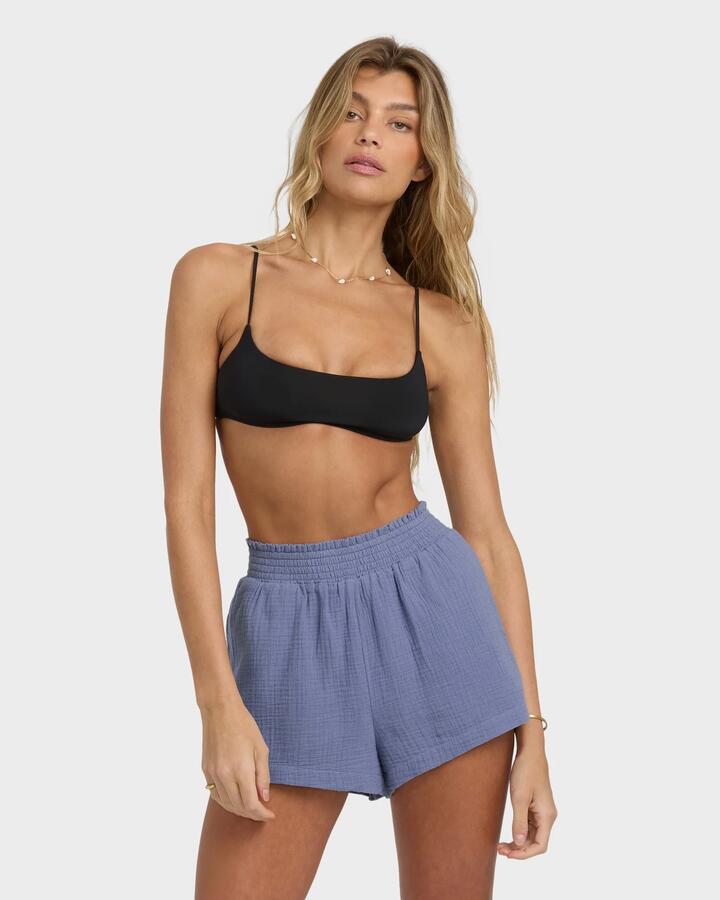 Image of a model wearing Shorts. Productname: Billabong Womens In The Waves Elastic Waist Shorts Stone Blue - in Stone Blue colour by brand - Billabong