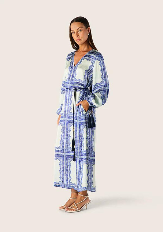 Image of a model wearing Tops. Productname: Jordi Long Sleeve Maxi Dress | MOS The Label in Jordi Print colour by brand - MOS The Label