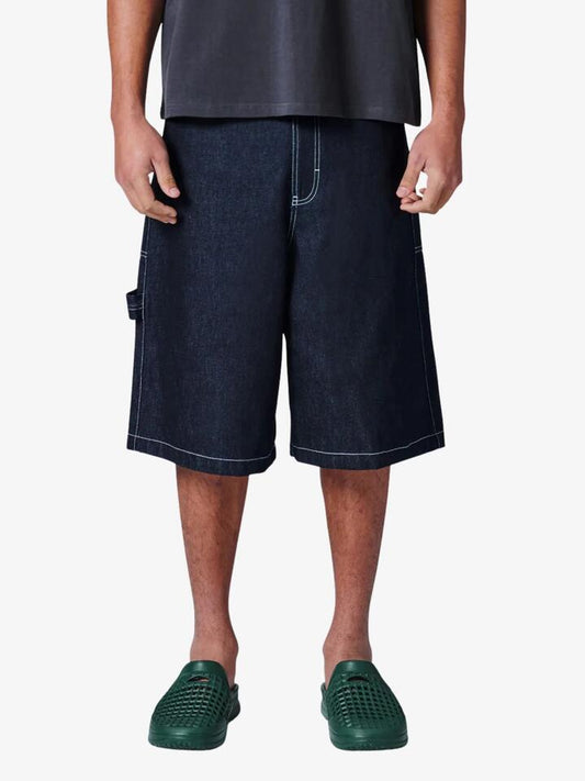 Image of a model wearing Denim. Productname: Barney Cools Denim Jorts in Raw colour by brand - Barney Cools