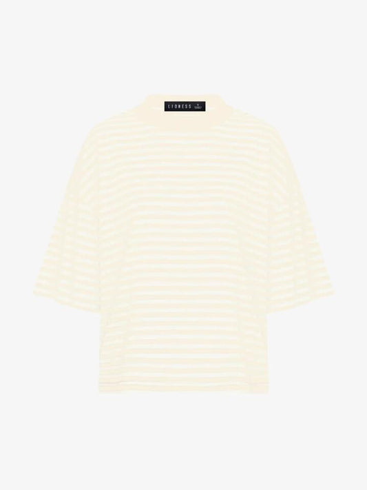 Image of a model wearing Shorts. Productname: Lioness Bloom Short Sleeve Tee in Lemontini colour by brand - Lioness