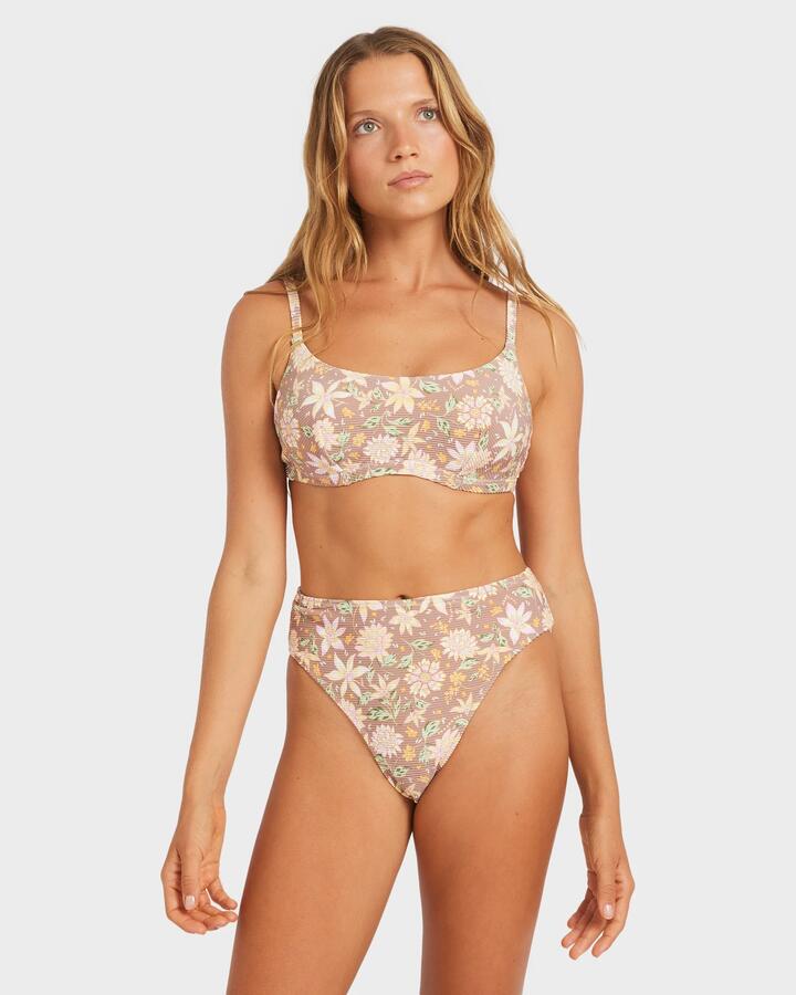 Image of a model wearing Tops. Productname: Roxy Womens Garland D Cup Bralette Bikini Top Nutmeg - in Nutmeg colour by brand - Roxy