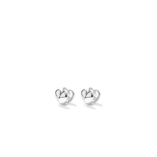 Image of Earrings. Productname: 15mm Puff Heart Huggie Earrings in Sterling Silver in Silver colour by brand - Bevilles