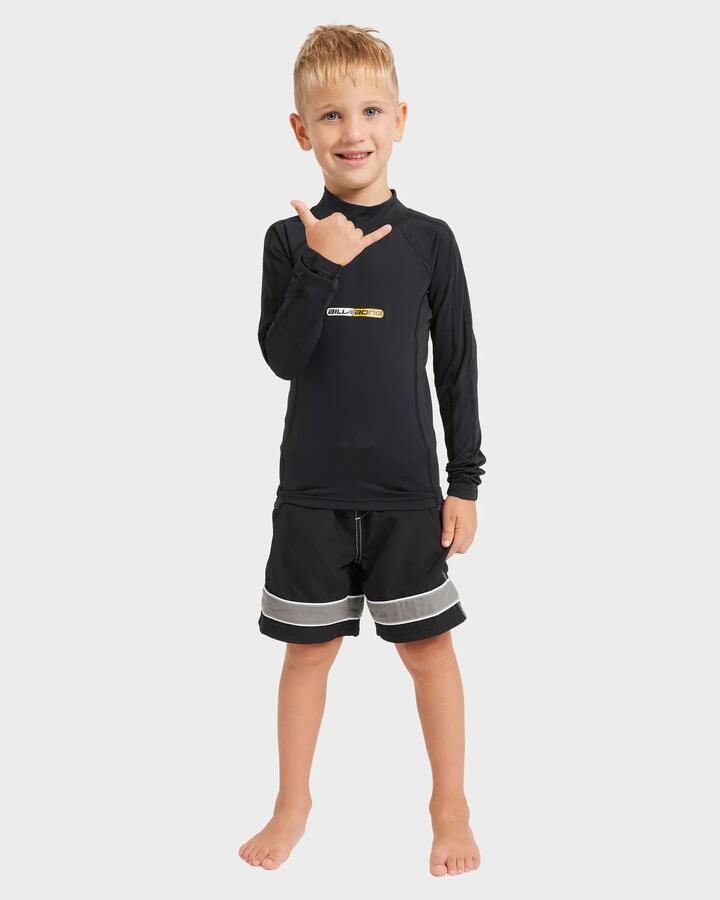 Image of a model wearing Tops. Product name - Billabong Boys 0-7 Spec 73 Performance Long Sleeve Rash Vest Black in Black colour by brand - Billabong
