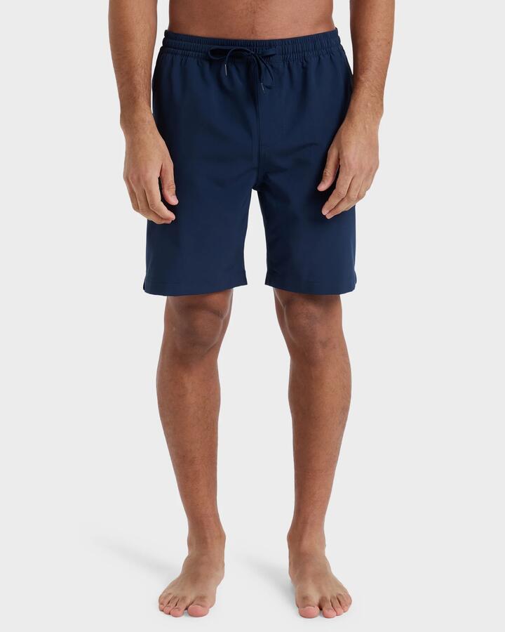 Image of a model wearing Shorts. Product name - Quiksilver Mens Taxer Amphibian 18" Hybrid Shorts Dark Navy in Dark Navy colour by brand - Quiksilver