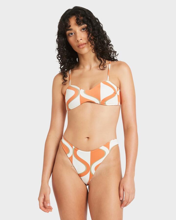 Image of a model wearing Tops. Productname: RVCA - Womens Mind Map Reversible Bralette Bikini Top - Antique White - in Antique White colour by brand - RVCA