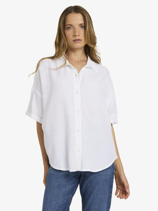 Image of a model wearing Tops. Productname: Roxy - Womens Beachy Nastalgia Short Sleeve Shirt - White - in White colour by brand - Roxy