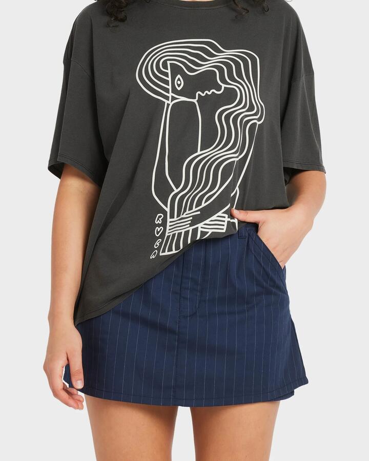 Image of a model wearing Skirts. Product name - RVCA Womens Bode Skort Starry Night in Starry Night colour by brand - RVCA