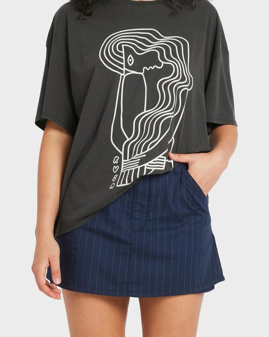 Image of a model wearing Skirts. Productname: RVCA - Womens Bode Skort - Starry Night - in Starry Night colour by brand - RVCA