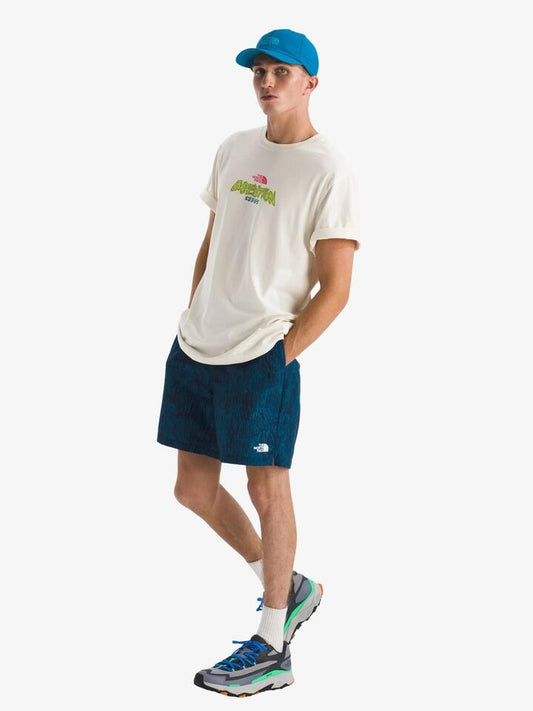 Image of a model wearing Tops. Productname: The North Face Men's TNF Essential Expedition Series Tee in White Dune colour by brand - The North Face