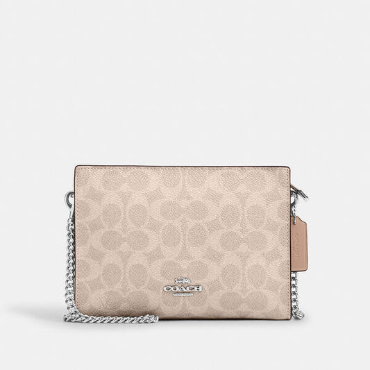 Image of Bags. Productname: Slim Crossbody Bag In Signature Canvas in SAND/TAUPE colour by brand - Coach Outlet Australia
