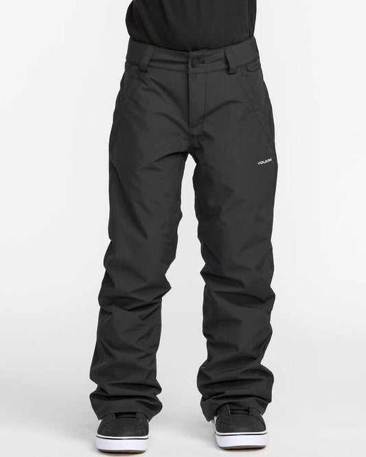 Image of a model wearing Pants. Product name - Volcom Boys 8-16 Freakin Chino Snow Pants Black in Black colour by brand - Volcom