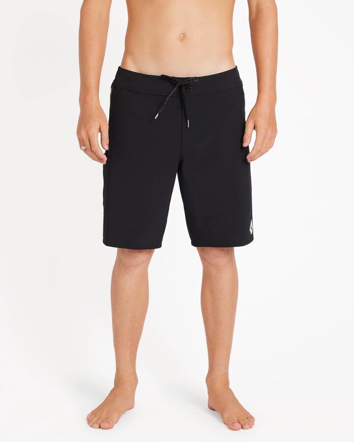 Image of a model wearing Shorts. Product name - Volcom Mens Command Liberator 20" Boardshort Black in Black colour by brand - Volcom