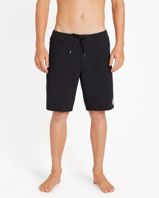Image of a model wearing Shorts. Product name - Volcom Mens Command Liberator 20" Boardshort Black in Black colour by brand - Volcom