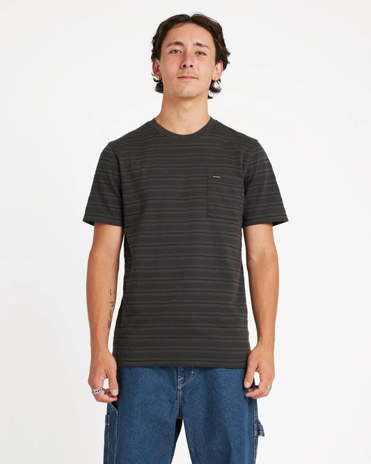 Image of a model wearing Tops. Product name - Volcom Mens Dorture Crew Short Sleeve Shirt Stealth in Stealth colour by brand - Volcom