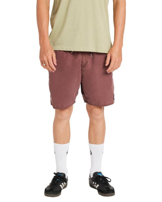 Image of a model wearing Shorts. Product name - Volcom Mens Center Trunk 17" Swim Shorts Merlot in Merlot colour by brand - Volcom