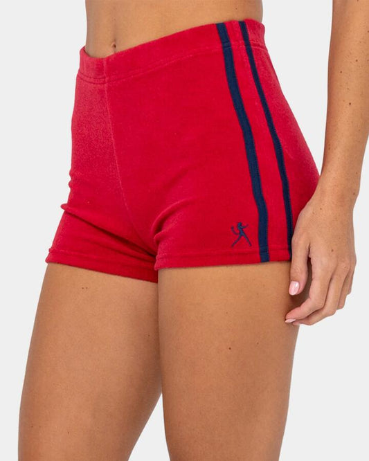 Image of a model wearing Shorts. Productname: rusty Womens Bodhi Towelling Booty Elastic Waist Shorts Red - in Red colour by brand - Rusty