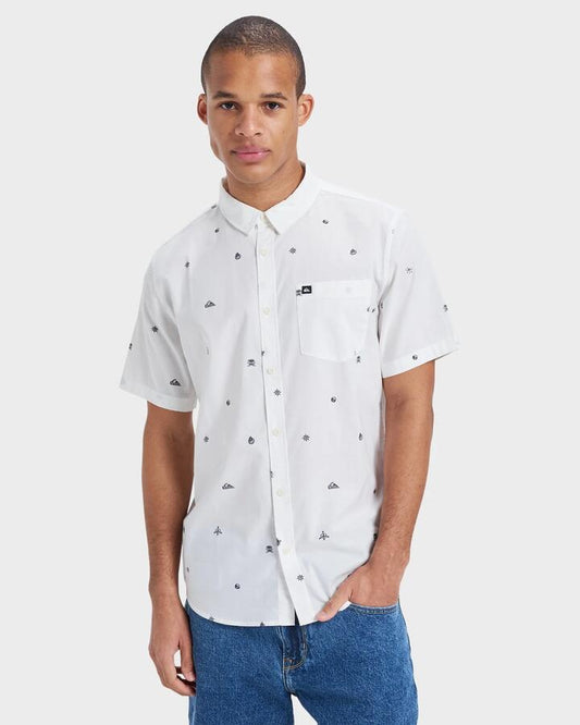 Image of a model wearing Tops. Productname: Quiksilver - Mens Apero Classic Short Sleeve Shirt - Snow White Mini Connection 32 - in Snow White Mini Connection 32 colour by brand - Quiksilver