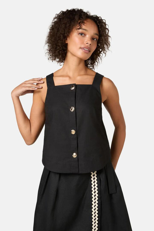 Image of a model wearing Tops. Product name - Wilder Organic Cotton Tank in Black colour by brand - Gorman