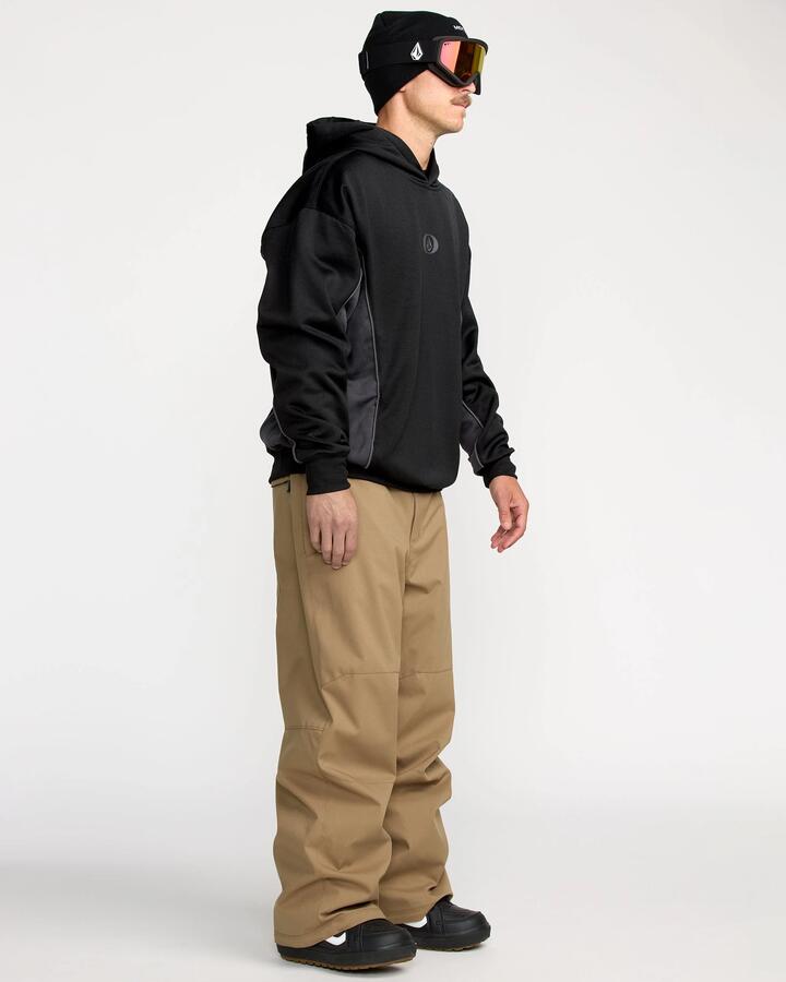 Image of a model wearing Pants. Product name - Volcom Mens Billow Snow Pants Bronze in Bronze colour by brand - Volcom