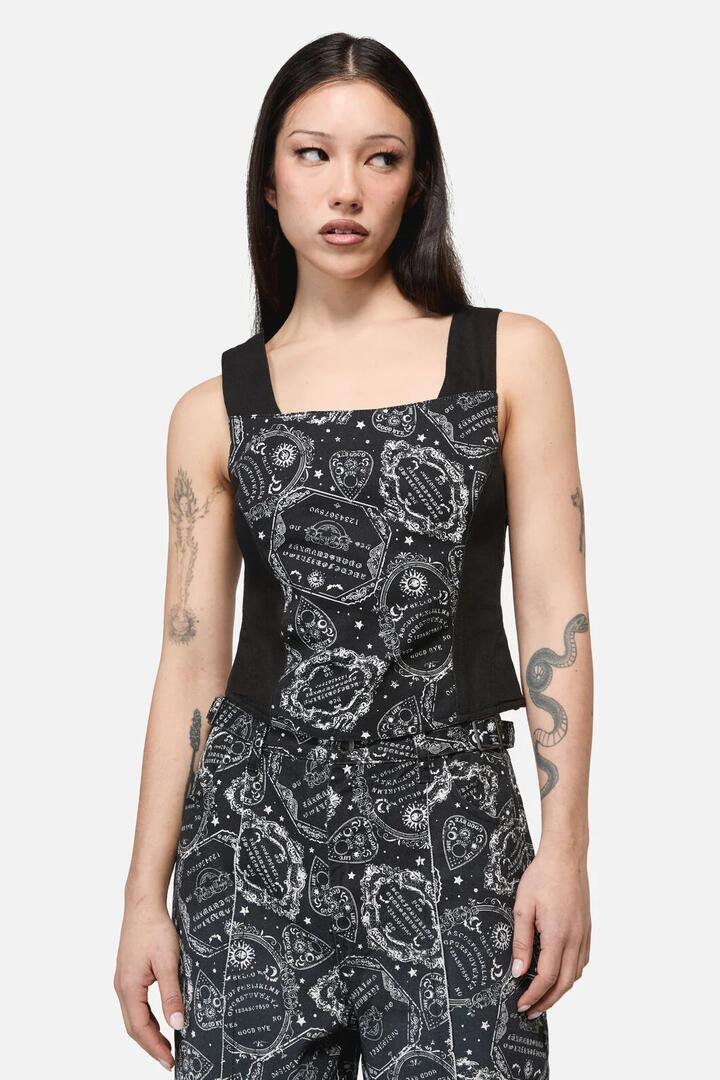 Image of a model wearing Tops. Product name - SÃ©ance Print Goth Corset Top in Black colour by brand - Dangerfield