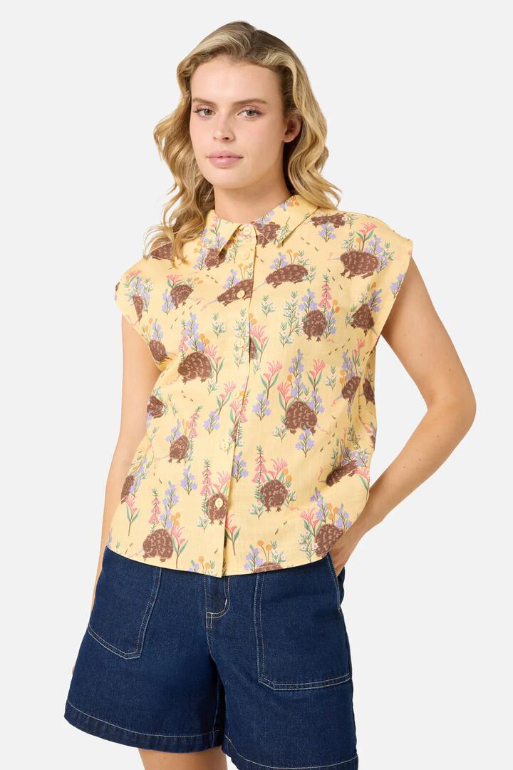 Image of a model wearing Tops. Productname: Echidna Sleeveless Shirt in Yellow colour by brand - Princess Highway