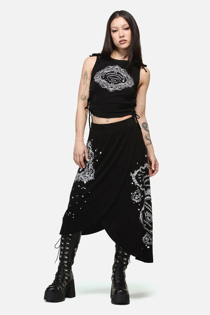 Image of a model wearing Skirts. Product name - SÃ©ance Layered Goth Midi Skirt in Black colour by brand - Dangerfield