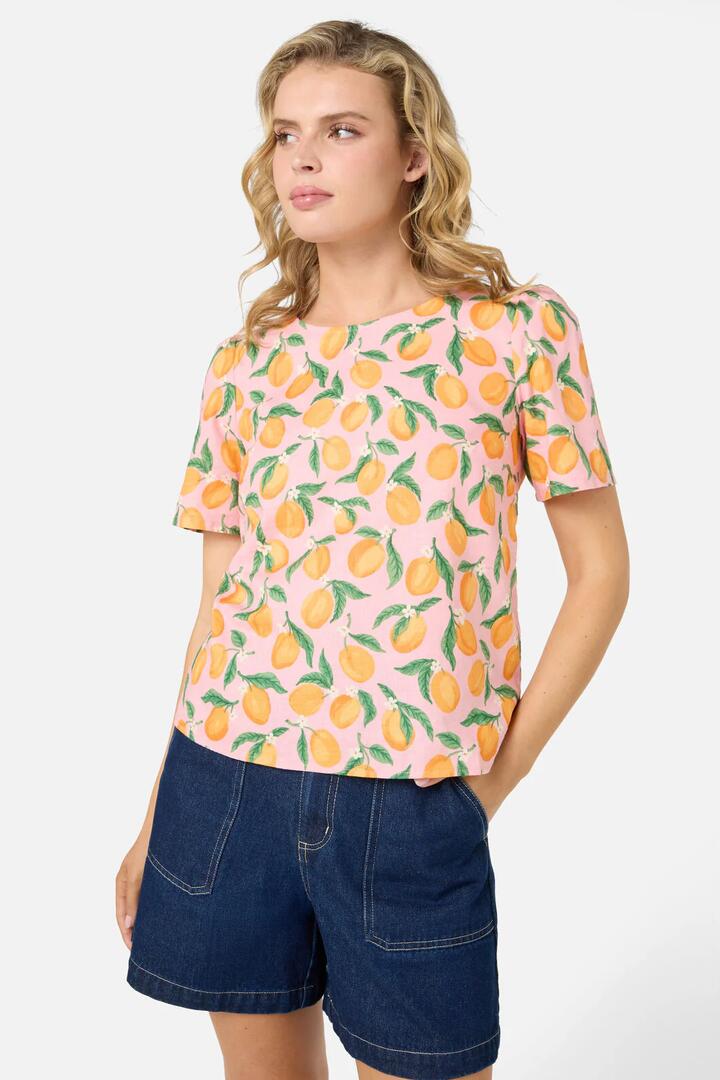 Image of a model wearing Tops. Productname: Apricots Short Sleeve Top in Pink colour by brand - Princess Highway