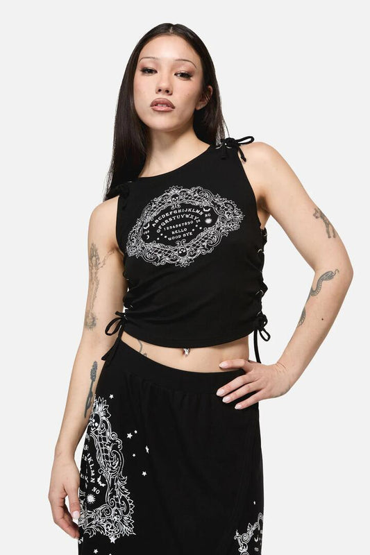 Image of a model wearing Tops. Product name - SÃ©ance Goth Print Tank Top in Black colour by brand - Dangerfield