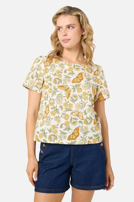 Image of a model wearing Tops. Productname: Yvette Butterfly Top in Cream colour by brand - Princess Highway
