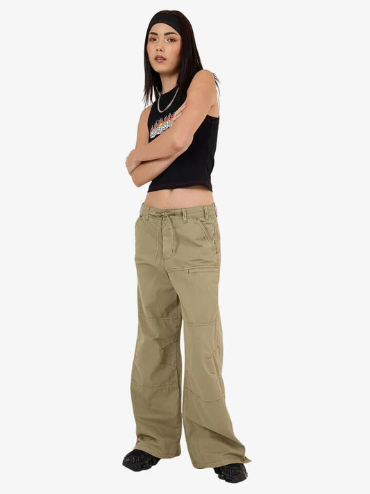 Image of a model wearing Pants. Productname: Worship No Doubt Utility Pant in Kelp colour by brand - Worship