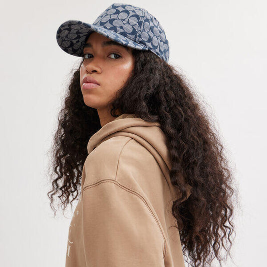 Image of Hats. Productname: Signature Chambray Baseball Cap in CHAMBRAY colour by brand - Coach Outlet Australia