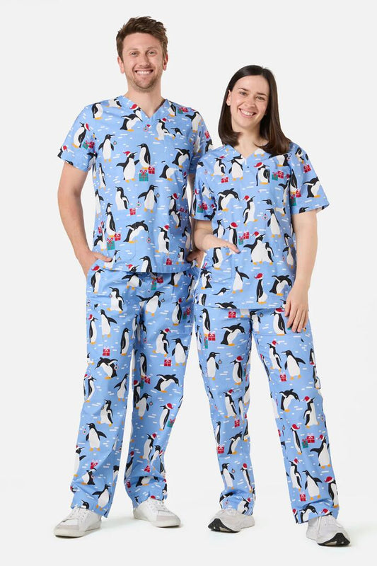 Image of a model wearing Uniforms & Workwear. Productname: North Pole Scrub Set in Blue colour by brand - Scrubs With Love