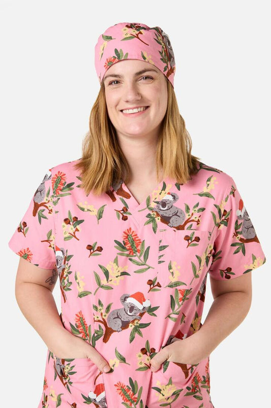 Image of Hats. Productname: Christmas Koala Pink Scrub Hat in Pink colour by brand - Scrubs With Love