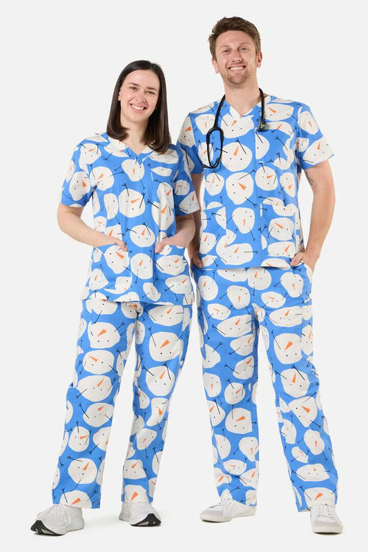 Image of a model wearing Uniforms & Workwear. Productname: Snowman Scrub Set in Blue colour by brand - Scrubs With Love