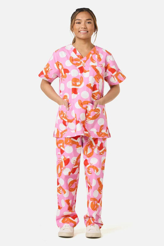 Image of a model wearing Uniforms & Workwear. Productname: Christmas Lobster Scrub Set in Pink colour by brand - Gorman