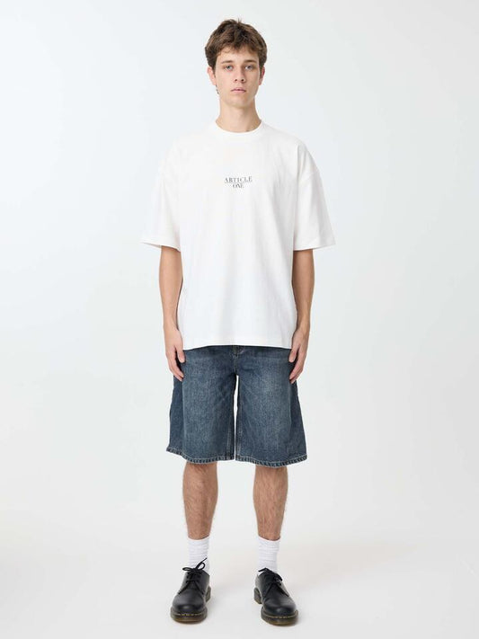 Image of a model wearing Tops. Productname: Article One Nice Serif Tee in White colour by brand - Article One