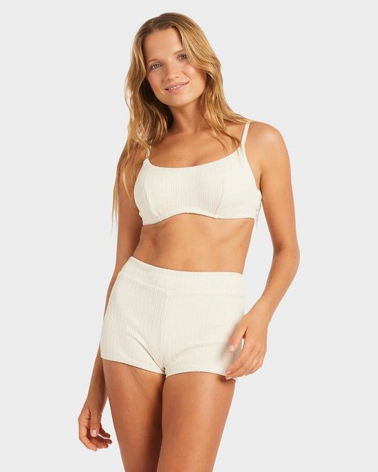 Image of a model wearing Tops. Productname: Roxy - Womens Aruba D Cup Bralette Bikini Top - Parchment - in Parchment colour by brand - Roxy