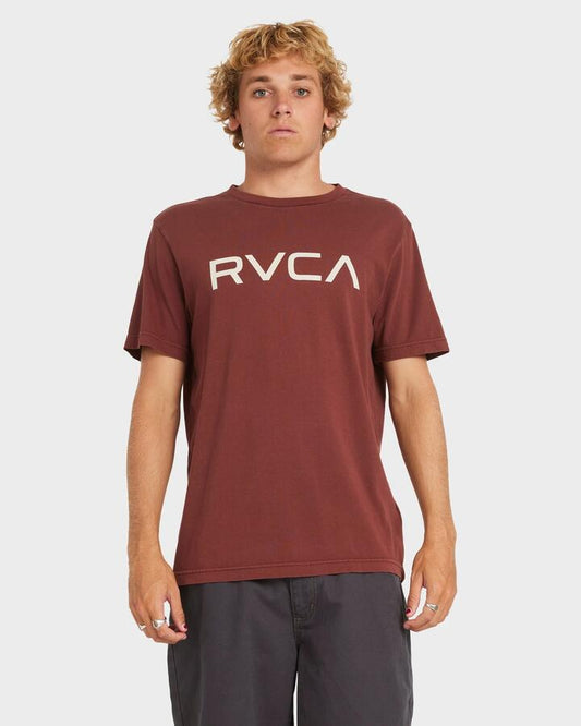 Image of a model wearing Tops. Productname: RVCA Mens Big Rvca T-Shirt Red Earth - in Red Earth colour by brand - RVCA