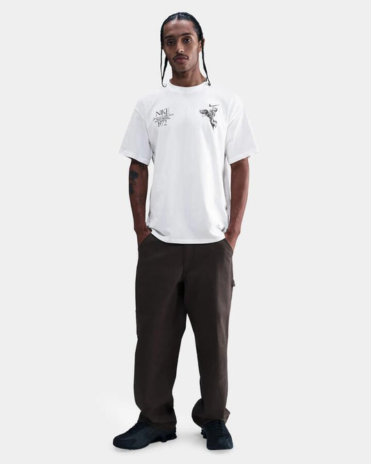 Image of a model wearing Tops. Productname: nike Mens Sportswear Max90 T-Shirt White - in White colour by brand - Nike