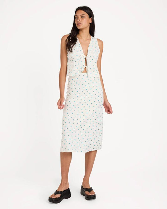 Image of a model wearing Skirts. Productname: RVCA Womens Rose Bud Annika Midi Skirt White - in White colour by brand - RVCA