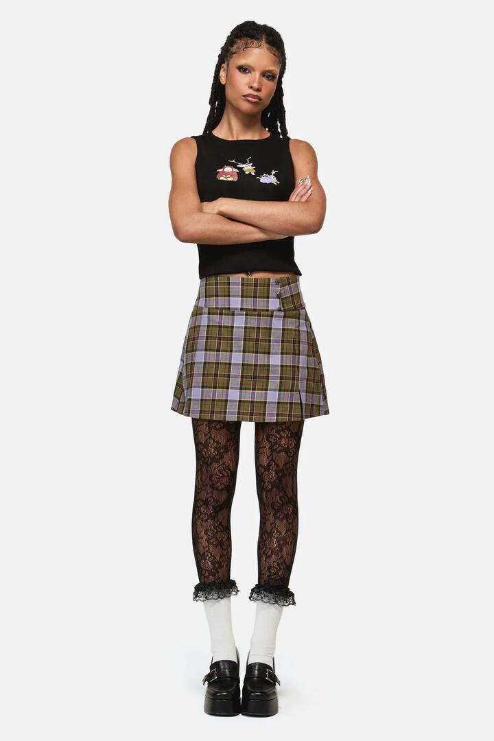 Image of a model wearing Skirts. Product name - Apothecarius Tartan Goth Skort in Moss/Lavender colour by brand - Black Friday