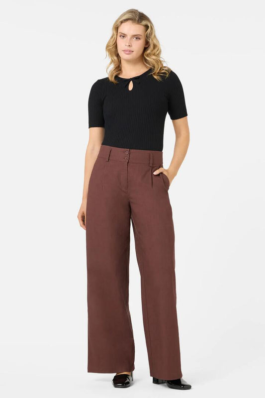 Image of a model wearing Pants. Productname: Tatum Mid Rise Pants in Chocolate colour by brand - Princess Highway