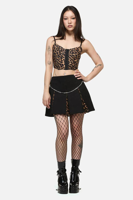 Image of a model wearing Skirts. Productname: Leopard Contrast Pleat Grunge Skort in Black colour by brand - Dangerfield