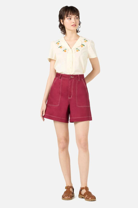 Image of a model wearing Shorts. Productname: Ruby Drill Shorts in Wine colour by brand - Princess Highway