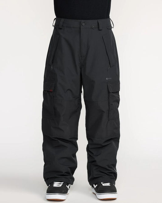Image of a model wearing Pants. Product name - Volcom Mens Longo Gore-Tex Pant Black in Black colour by brand - Volcom